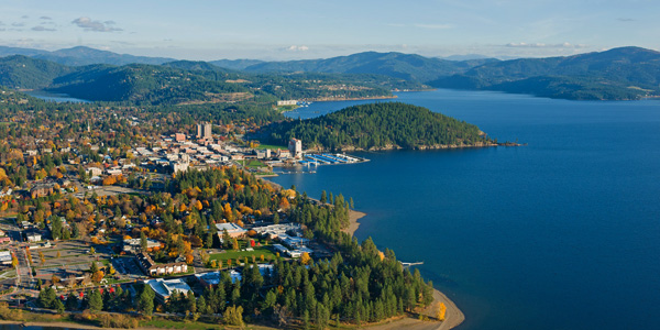 North Idaho Web Design and Marketing integrating iconic views of downtown Coeur d'Alene and Tubbs Hill for impactful SEO.