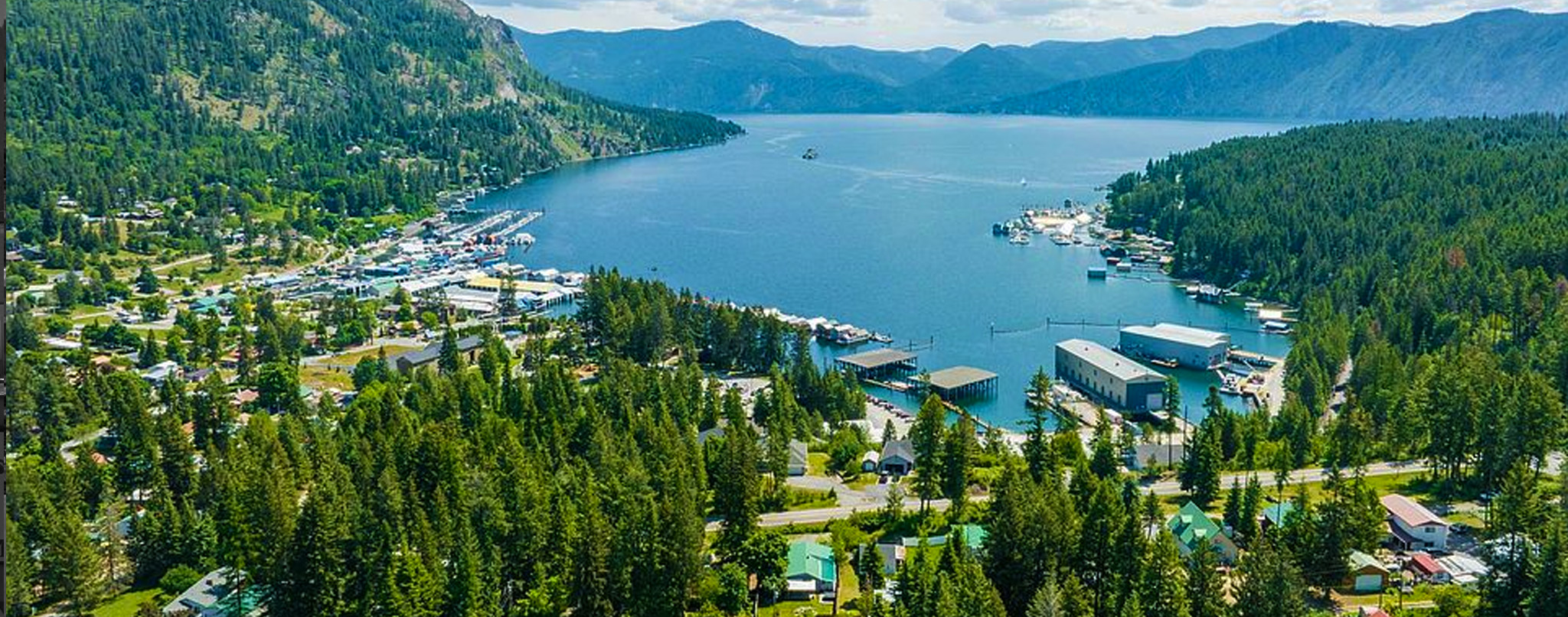 Quiet forest road and orange-lit sunset in Bayview