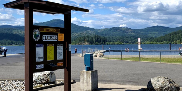 Hilltop view near Hauser overlooking lake and rural homes